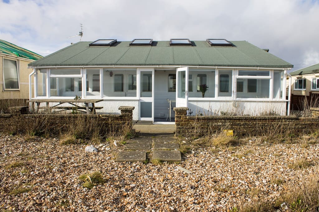 gorgeous train carriages on the beach