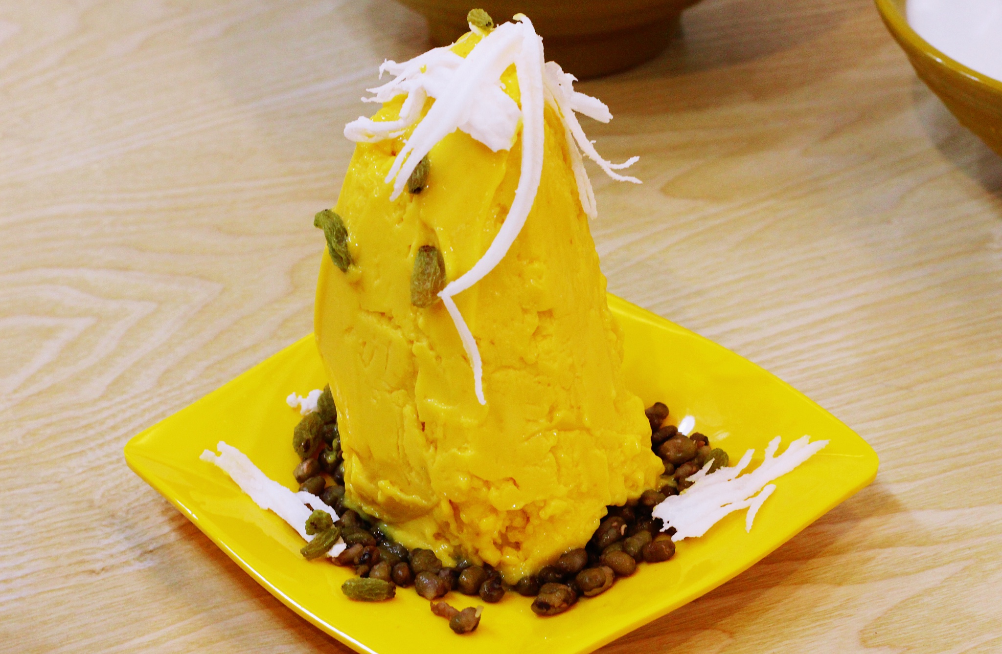 一份芒果炒冰份量超足,完全够2个人食用.